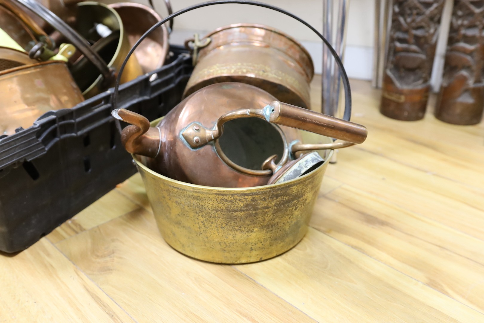 Mixed copper kettles, brass pot, a copper scuttle etc.